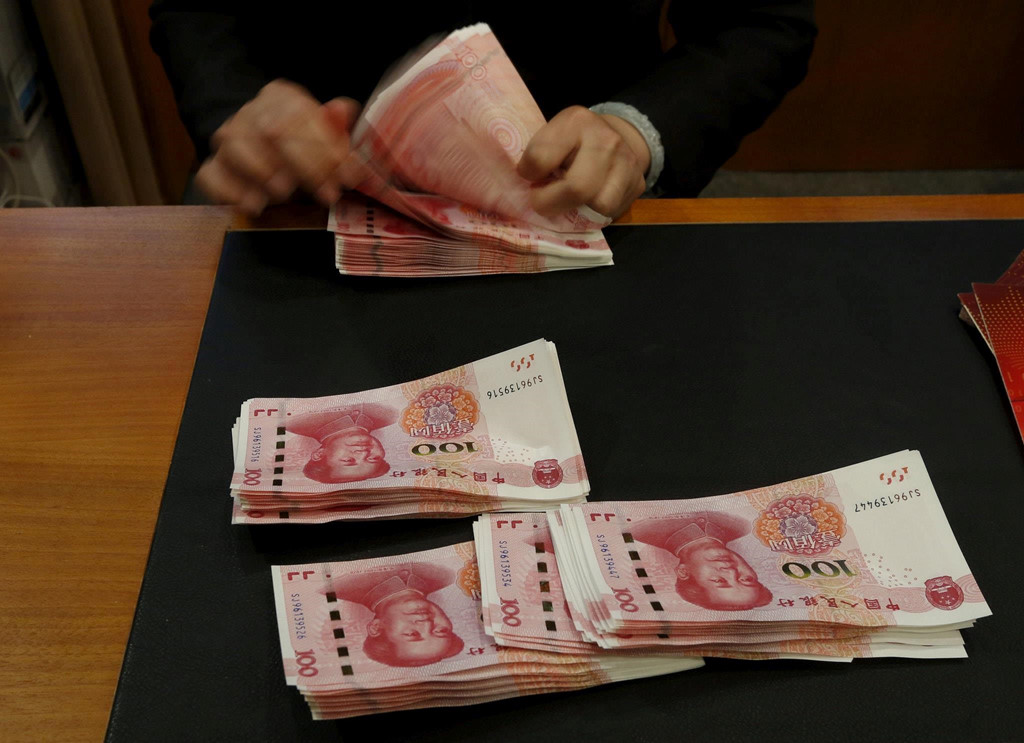 Trung Quốc khai hỏa chiến tranh tiền tệ, 'sóng thần đang ập tới'